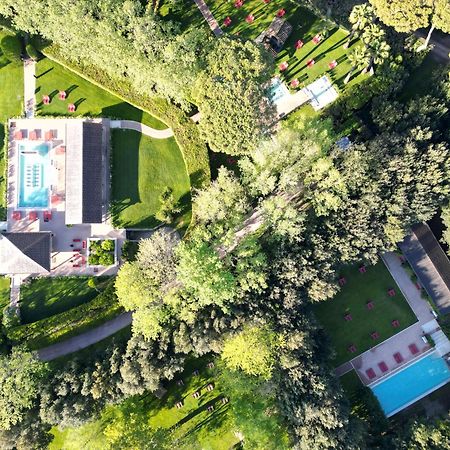 Qc Termeroma Spa And Resort Fiumicino Esterno foto Aerial view of the school