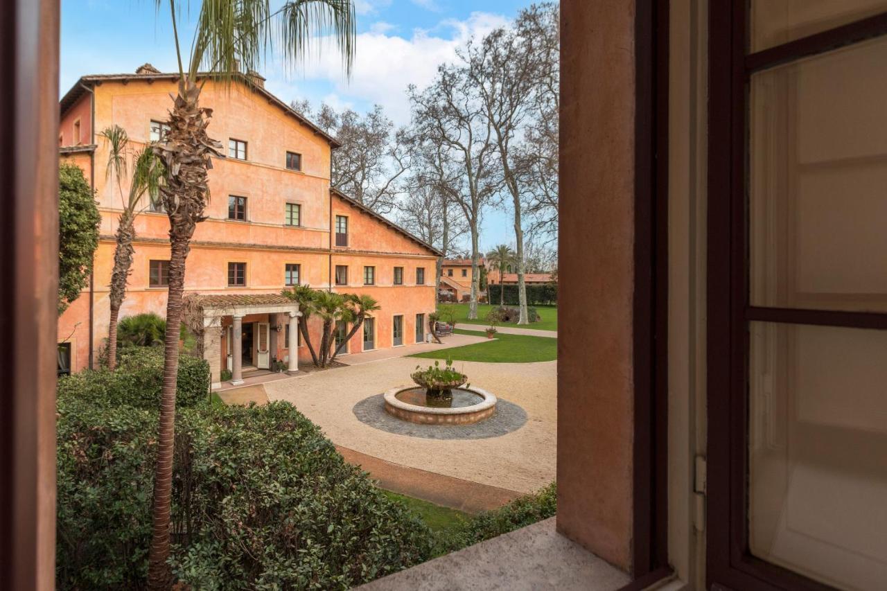 Qc Termeroma Spa And Resort Fiumicino Esterno foto The courtyard of the museum