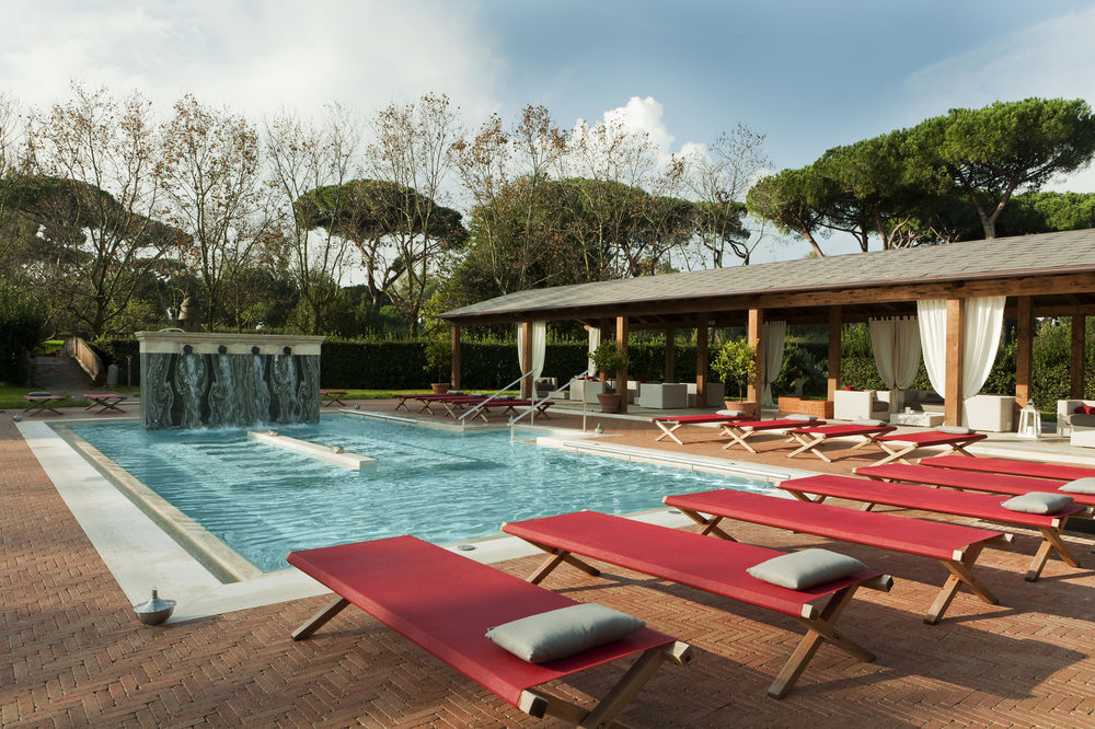 Qc Termeroma Spa And Resort Fiumicino Esterno foto The pool at the resort